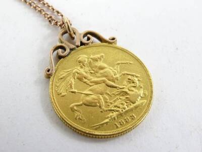 A Victorian full gold sovereign pendant and chain, dated 1883, with rose gold mount and fine link chain, yellow metal, unmarked, 12.7g all in. - 4