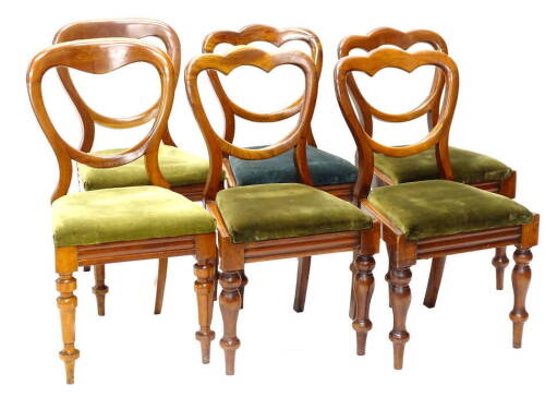 A harlequin set of six Victorian mahogany balloon back dining chairs, each with a drop in seat on turned tapering legs. Provenance: The property of Joan Stephenson, Kirkwood, North Church Walk, Newark, Nottinghamshire.