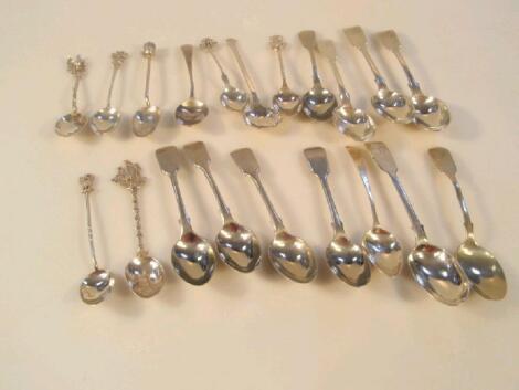 A collection of silver souvenir teaspoons