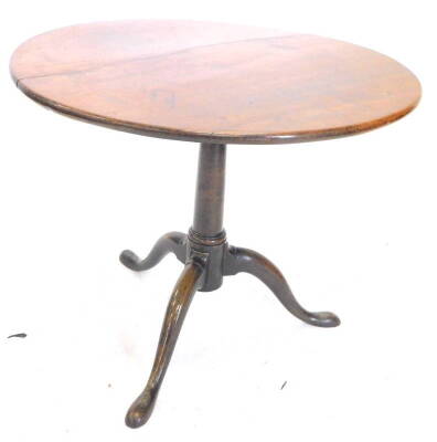 A 19thC mahogany occasional table, with a circular tilt top on a plain turned column, tripod base with pad feet, 67cm dia.