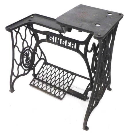 A Singer cast iron industrial sewing machine base, (AF), 70cm W.