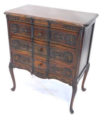 A continental stained beech serpentine commode chest, the break front top with a moulded edge, above three drawers, each carved with shells, scrolls etc., on fine cabriole legs headed by shells etc. 81cm H, 38cm D, 70cm W.