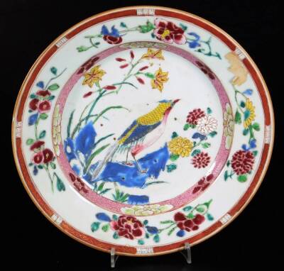 A pair of famille rose porcelain plates, decorated with exotic birds within a landscape, with inner border of pink ground and lotus flowers, scattered flower spray with an outer border of an orange ground and gilt bands, interestingly decorated with var - 8