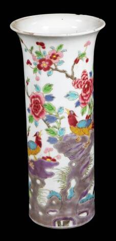 A Chinese flared cylindrical porcelain vase, decorated with exotic birds within a hollow rock landscape, 21cm H. (AF)