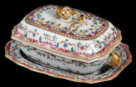 A Chinese porcelain tureen cover and stand, decorated with inner border of stylized clouds and flowers, between a gilt and red cell border, with again an outer border of stylized clouds and flowers, the tureen with animal mask handles in gilt, tureen over