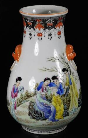 A Chinese Republic porcelain vase, of globular form with moulded dog and ring handles, polychrome decorated with various figures of ladies in flowing robes in an exterior setting, on circular foot, red four character seal mark beneath, 22cm H.