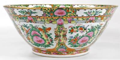 A 20thC Chinese famille rose punch bowl, of tapering circular form, decorated with panels of birds, butterflies and flowers, predominately in pink, green and yellow, on a circular foot, unmarked, 36cm Dia. - 3