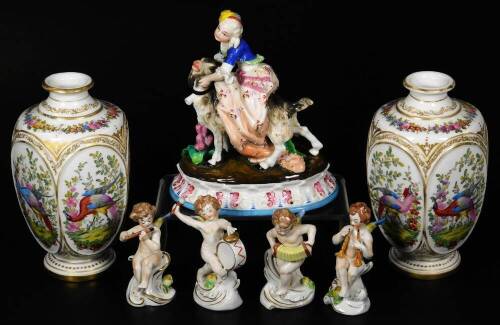 A Meissen style continental porcelain figure group, The Tailor's Wife Riding On A Goat, polychrome decorated predominately in pink, blue and green, 21cm H, four Capodimonte figures of cherub bandsman, and two 20thC vases, with gilt highlights, decorated w