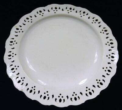 An early 19thC Wedgwood creamware plate, of flared form, with pierced and moulded border, impressed marks beneath, 19cm W. - 2