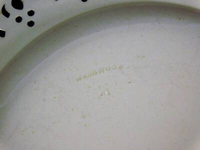 An early 19thC Wedgwood creamware plate, of flared form, with pierced and moulded border, impressed marks beneath, 19cm W. - 3