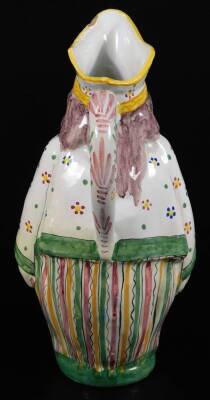 A French faience Toby jug decorated in bright colours, c.1900. 28cm H. - 3