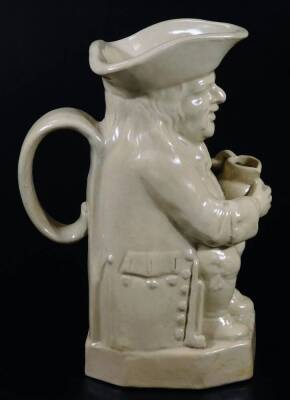 A small Majolica glazed Toby jug, with crimson coat, c.1900. 19cm H, together with a Pearson's of Chesterfield Toby jug, impressed mark for Oldfield, 22cm H. - 8