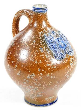 A late 19thC Martin Brothers pottery flagon, inscribed Martin Bros London and Southall 1891, decorated with brown speckled glazes, 24cm H.