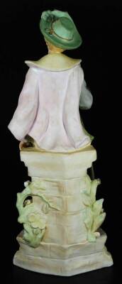 A continental bisque porcelain figure of a gentleman, in standing pose aside dog, he holding cup aside wall, on a floral lined base, predominately in pink, green and fawn with gilt highlights, no. 5816 25, 40cm H. - 3