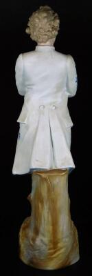 A continental bisque porcelain figure of a gentleman, standing holding lorgnette, in floral finery, predominately in blue, on a naturalistic base, unmarked, 44cm H. - 3