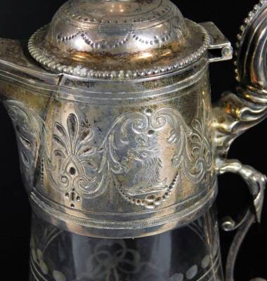 A Victorian silver and etched glass claret jug, with urn finial, domed lid, beaded S scroll handle and etched mounts, the engraved trumpet body decorated with an upper and lower bead banding and set with flowers, London 1870, 28cm H. - 2