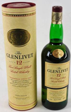 A bottle of Glenlivet 12 Year Old Single Malt Scotch Whisky, 1 litre bottle, in card tube.