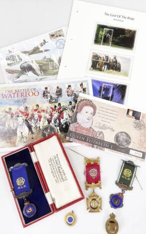 Various Masonic medals, awards, etc. gilt coloured Buffalo medal, 9cm H, others partially cased, various anniversary coin sets, Lord Of The Rings New Zealand stamps, etc. (a quantity)