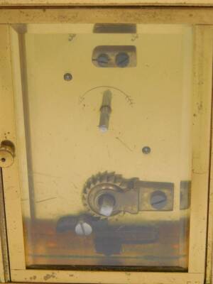 A brass cased carriage clock for Garrard & Company Limited, 112 Regent St, London W1, rectangular dial bearing Roman numerals, the case with fluted sides, 12.5cm H, 8cm W, 6cm D. - 3