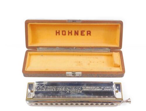 A Hohner Chromonica, The Sixty Four, four chromatic octaves professional model, cased.