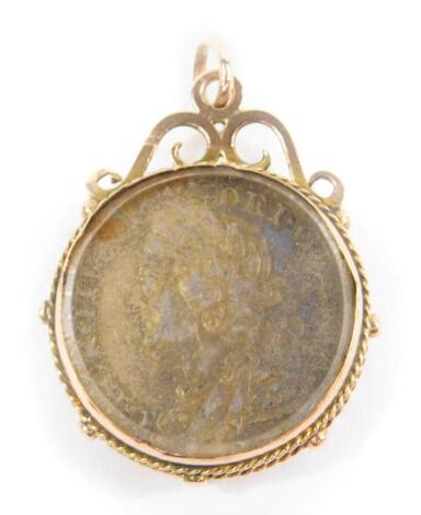 A George II silver shilling 1758, in a 9ct gold pendant mount, 16.9g.