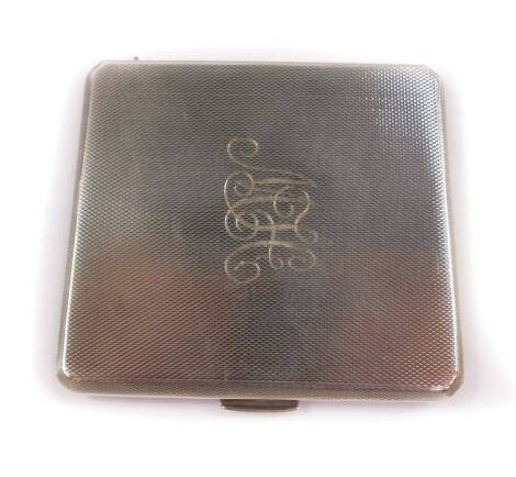 A George VI silver cigarette case, with engine turned decoration, monogram engraved, Birmingham 1937, 2.92oz.