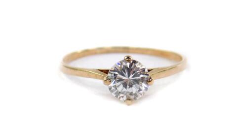 A 9ct gold and cubic zirconia solitaire ring, high claw set, size U, 1.9g.