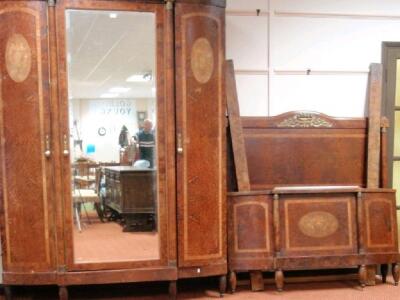 A 19thC French inlaid birds-eye maple armoire with double bed en suite