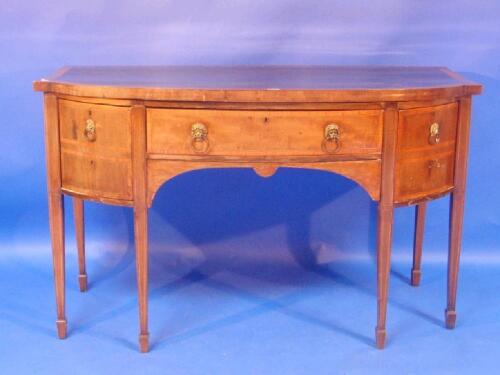 A 19thC mahogany bow front sideboard with a satinwood cross banded and boxwood strung top