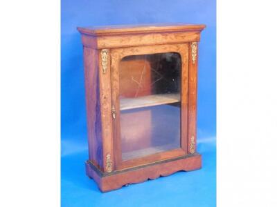 A Victorian walnut marquetry pier cabinet