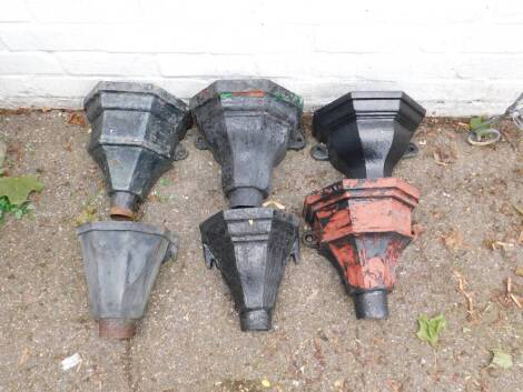 Six cast iron hoppers, mixed sizes.