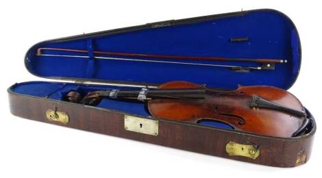 A violin, with two piece back, length of back 35cm, a violin bow and a late 19th/early 20thC rosewood veneered violin case with silver plated mounts. (AF)