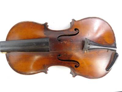 A violin, with two piece back, length of back 35cm, a violin bow and a late 19th/early 20thC rosewood veneered violin case with silver plated mounts. (AF) - 2