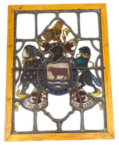 A 19thC leaded stained glass window, decorated with the crests of the City of Oxford, with Latin motto Fortis Veritas, later framed, 84cm x 60cm.