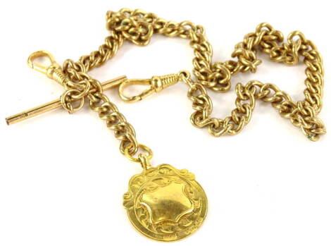 A rolled gold watch chain and a 9ct gold shield fob, the chain with two clips and t-bar, with circular shield fob, the fob only 4.1g all in.