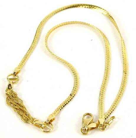 An 18ct gold necklace, with fine link design drop area, and cross ball links, on articulated chain, 42cm L.