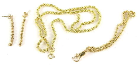 A rope twist necklace, bracelet, and earring set, all yellow metal, marked 9ct, the necklace 41cm L, bracelet, 19cm L, earrings 4cm drop, 6.1g all in.