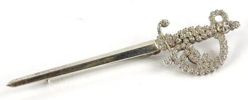 A silver dagger brooch, with floral design handle, Chester hallmark, bearing makers stamp for Charles Horner, 8cm W, 5.8g all in.