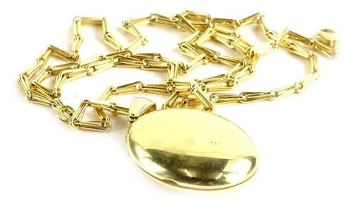 An 18ct gold locket and chain, stamped 750, 55g.