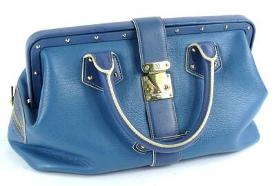 A Louis Vuitton Angers PM handbag, in blue suhari leather, with brass hardwear, stamped Louis Vuitton made in France to interior, with dustbag, 34cm W, 17cm H, 15cm D.