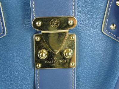 A Louis Vuitton Angers PM handbag, in blue suhari leather, with brass hardwear, stamped Louis Vuitton made in France to interior, with dustbag, 34cm W, 17cm H, 15cm D. - 2