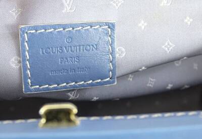 A Louis Vuitton Angers PM handbag, in blue suhari leather, with brass hardwear, stamped Louis Vuitton made in France to interior, with dustbag, 34cm W, 17cm H, 15cm D. - 4