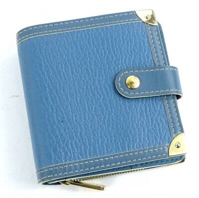 A Louis Vuitton leather bi-fold wallet, in blue, with brass zipper, stamped Louis Vuitton made in France to interior.