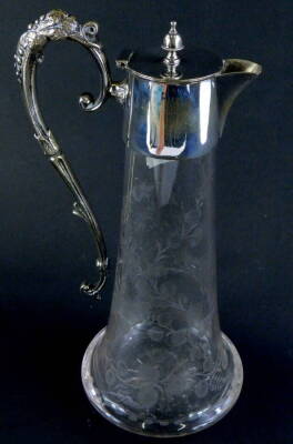 An early 20thC etched cut glass claret jug, the bell shaped body with plated mounts and scroll handle.