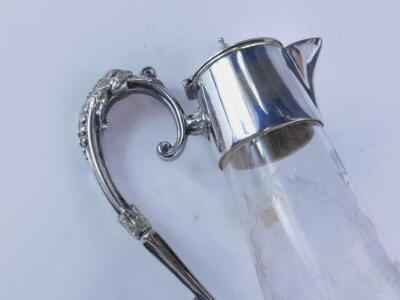 An early 20thC etched cut glass claret jug, the bell shaped body with plated mounts and scroll handle. - 2