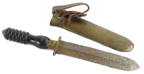 An early 20thC diver's knife, with black handle and heavy brass scabbard, probably Siebe Gorman. (AF)