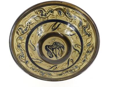 A Studio Pottery bowl, decorated in the centre with a stylised horse and with bands of horses, scrolls etc., unmarked, 36cm dia. - 2