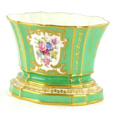 A Royal Crown Derby porcelain small oval jardiniere, decorated with flowers within a gilt cartouche, on a green ground, printed mark in red to underside, 13cm W.