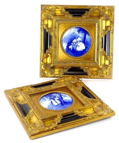 A pair of Royal Doulton style plaques, each printed in blue with children, pseudo marks to reverse, in gilt frames, 34cm W.