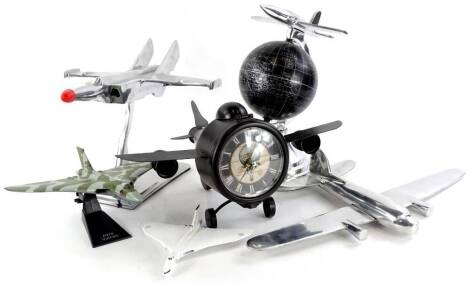 Various aviation related items, to include aluminium sculpture of a fighter jet, another similar of an aeroplane, a novelty aeroplane clock etc.